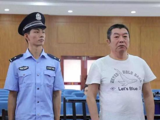 秦庆海在法庭上。黑龙江省纪委监委 图