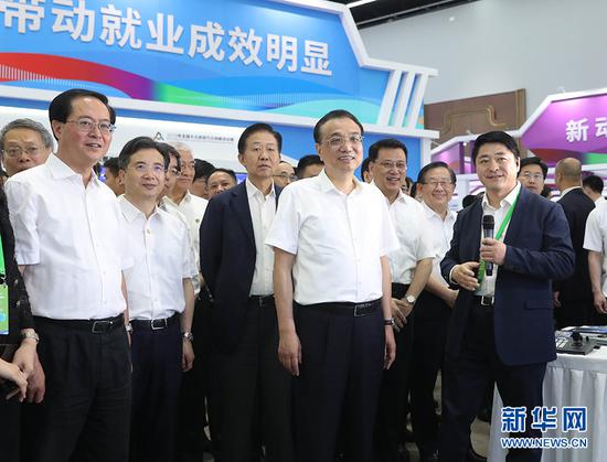 6月13日,中共中央政治局常委、国务院总理李克强在浙江杭州出席2019年全国大众创业万众创新活动周,并发表重要讲话。 新华社记者 刘卫兵 摄