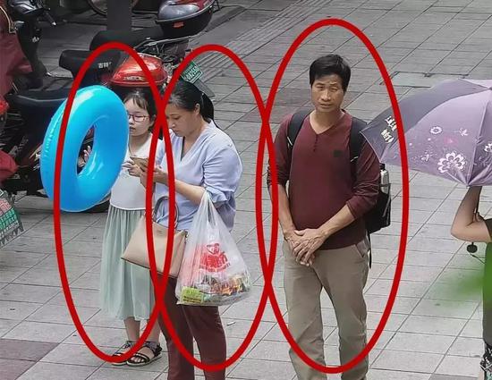 监控视频中,章子欣和梁、谢二人在一起。图片来自象山公安