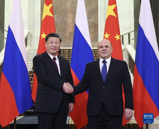 当地时间3月21日上午,国家主席习近平在俄罗斯联邦政府大厦会见俄罗斯总理米舒斯京。新华社记者 丁海涛 摄