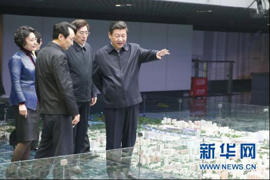 2014年2月，习近平在北京市考察。这是习近平在市规划展览馆了解北京城市总体规划。 新华社记者 鞠鹏 摄