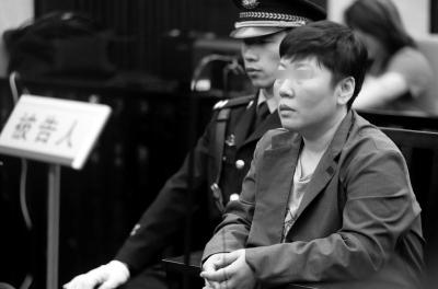 李某出庭受审。
京华时报记者欧阳晓菲摄