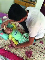 罗鸿锋将自己的四分之一肝脏捐给女儿。　家属供图