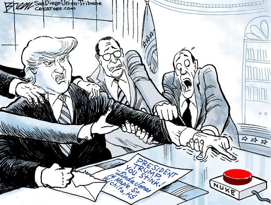 在民主党议员提出限制总统对于核武器的指挥权的时候，美国《圣迭戈联合论坛报》出了一张众人阻止特朗普按下核按钮的漫画