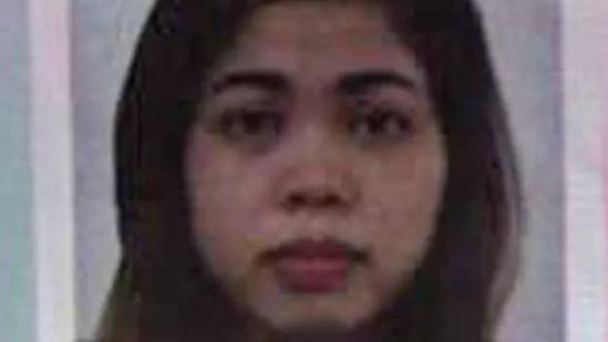 茜蒂艾莎护照上的照片。