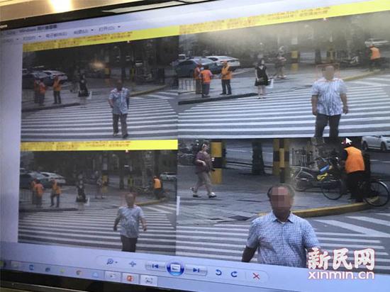  图说：人脸识别系统拍摄行人闯红灯图。胡彦珣摄