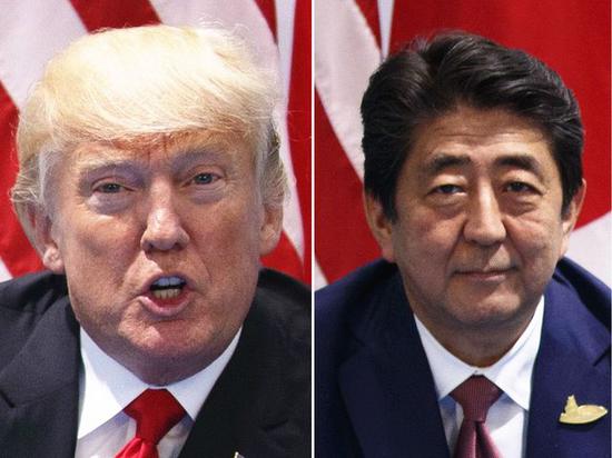 7月8日，德国汉堡，出席二十国集团领导人峰会的美国总统特朗普（左）与日本首相安倍晋三举行会晤。（新华/美联） 