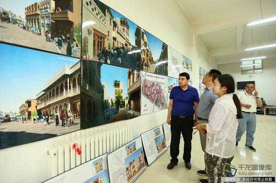 墨玉县老城改造注重保护历史风貌展板示意图（7月8日摄 图片来源：tuku.qianlong.com）。千龙网记者 许珠珠摄