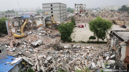 7月19日，北京市昌平区北七家镇白庙工业大院拆除现场（图片来源：tuku.qianlong.com）。千龙网记者 鄂晓颖摄