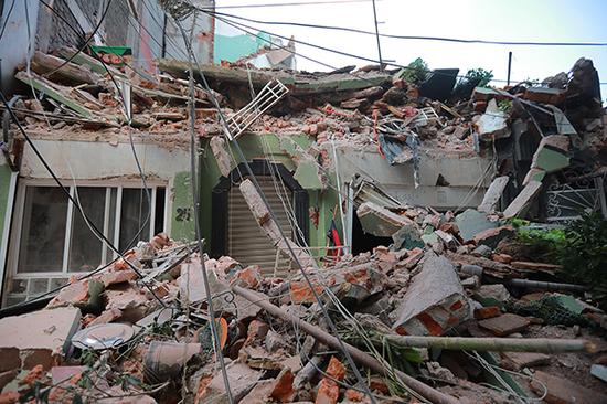 当地时间2017年9月19日，墨西哥首都墨西哥城，大批建筑物倒塌。 视觉中国 图