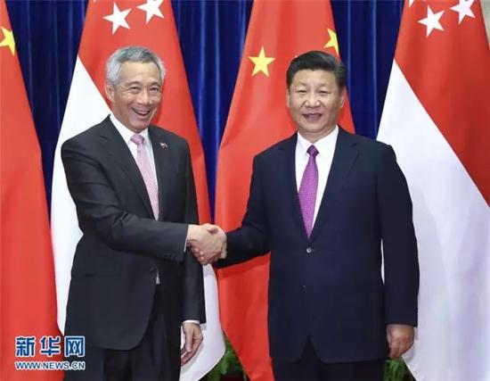 ▲9月20日,国度主席习近平在北京人口民大礼堂会晤来华举行正式会见之新加坡总理李显龙。新华社