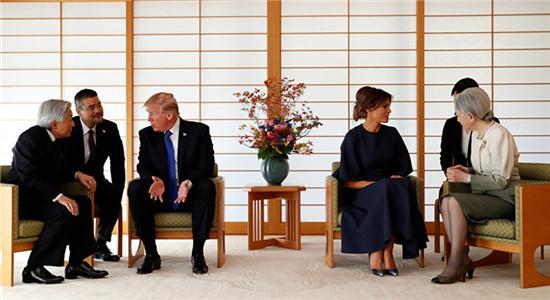  美国总统特朗普会见日本天皇夫妇（图源：路透社）