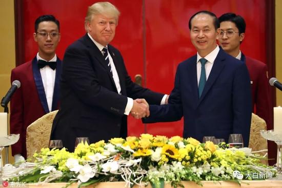 美国总统特朗普和越南国家主席陈大光(图/东方IC)