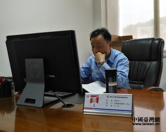 重庆市特种设备检测研究院电梯检验研究一中心主任、正高级工程师——张东平。（中国台湾网 王文英摄）