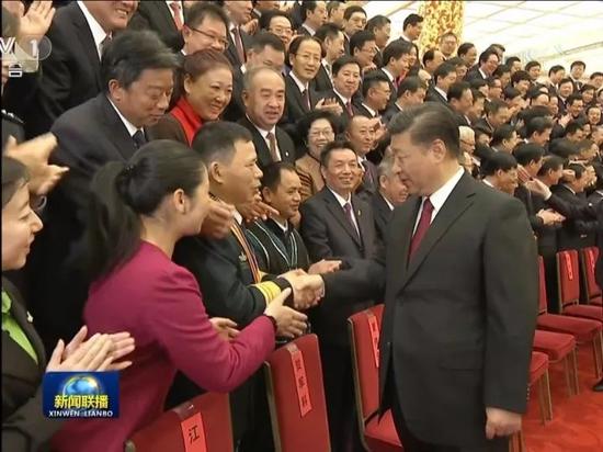 中共中央政治局常委、中央文明委主任王沪宁参加会见并出席表彰大会。