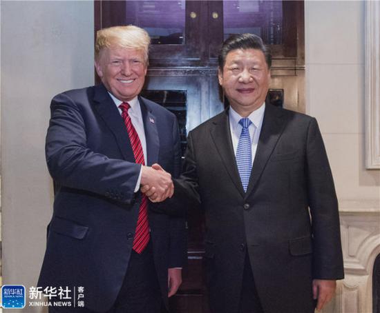 ↑当地时间12月1日,国家主席习近平应邀同美国总统特朗普在阿根廷布宜诺斯艾利斯共进晚餐,举行会晤。 新华社记者 李学仁 摄