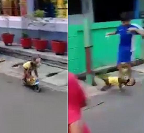 印尼街头猴戏表演出意外 小猴骑摩托撞倒儿童