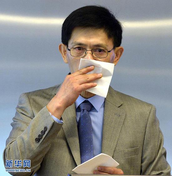 2015年9月15日,郗小星在发言时讲到动情处忍不住落泪。 新华网 资料图