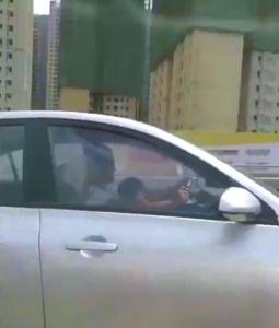 男子抱娃开车被拍视频举报 交警对其罚款扣分(图)