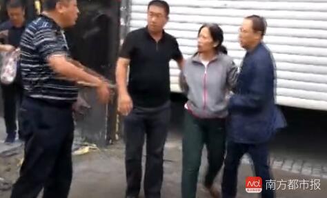  李艳滨被抓获现场。来源：黑龙江晨报
