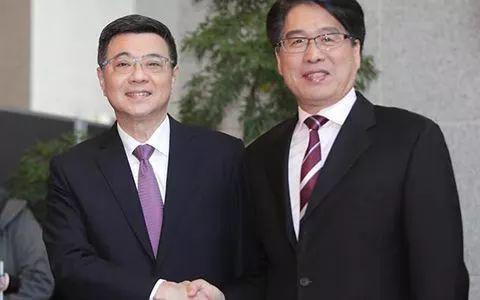 卓荣泰(左)与游盈隆