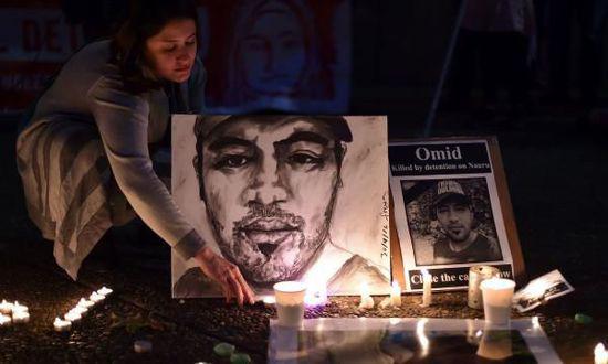 澳大利亚悉尼,人们点起蜡烛纪念自焚死亡的奥米德马苏马里