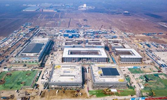 2月18日,雄安市民服务中心项目建设现场鸟瞰图。