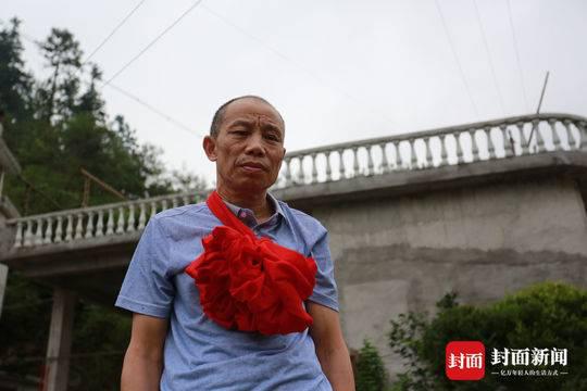 6月2日下午,李锦莲回到阔别20年的家乡江西省遂川县茂园村