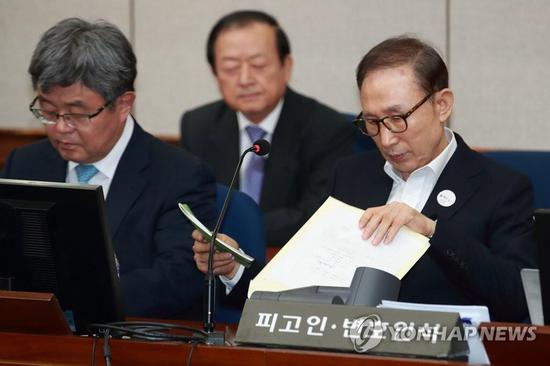 图注：韩国前总统李明博出庭受审
