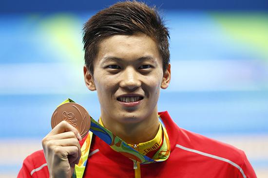 2016年里约奥运会游泳男子200米混合泳决赛，汪顺力压美国名将罗切特夺得铜牌。视觉中国 资料图