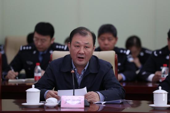 图为司法部副部长刘志强出席会议并讲话。 李光印 摄