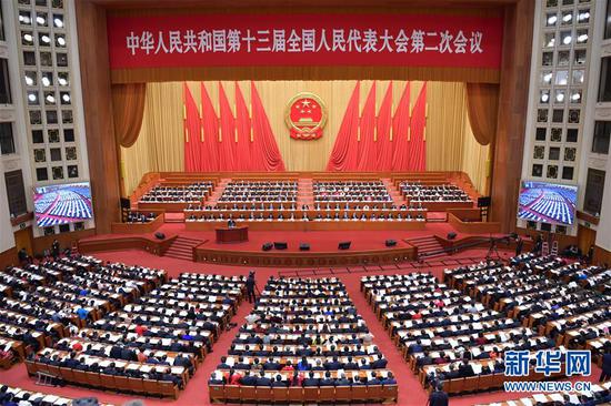 3月12日,十三届全国人大二次会议在北京人民大会堂举行第三次全体会议。 新华社记者 李涛 摄