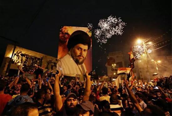 5月14日，什叶派宗教领袖萨德尔的支持者在伊拉克巴格达参加庆祝活动。新华社/美联