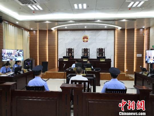 图为庭审现场。 黄汉柳 摄