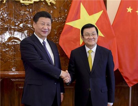 图为2015年11月6日，习近平同越南国家主席张晋创举行会谈。（李学仁摄）
