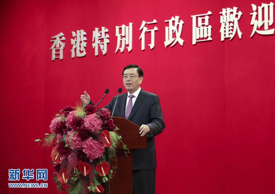 5月18日晚，全国人大常委会委员长张德江在香港会展中心参加香港社会各界欢迎晚宴并发表讲话。 新华社记者庞兴雷摄
