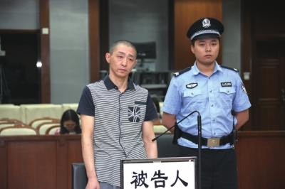 被告人在庭审现场。京华时报通讯员王鑫刚摄