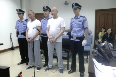 两被告人在法庭上认罪。京华时报记者郑羽佳摄