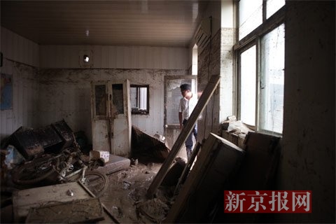 洪灾过后的村庄。新京报记者 王嘉宁 摄
