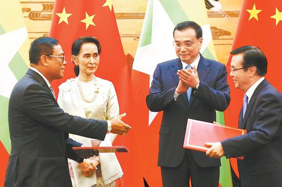 18日，国务院总理李克强与缅甸国务资政昂山素季共同见证了有关双边合作文件的签署。