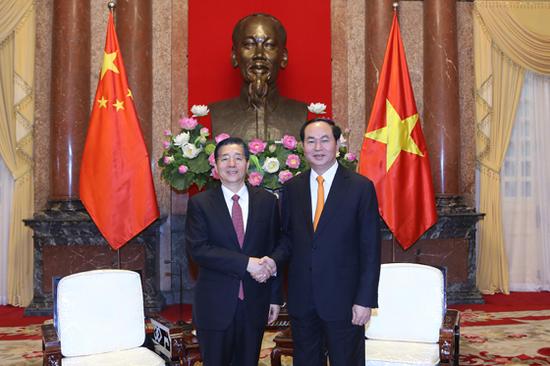 9月24日,越南国家主席陈大光在越南河内会见中国国务委员、公安部部长郭声琨。