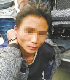 被抓获的犯罪嫌疑人杨清培。