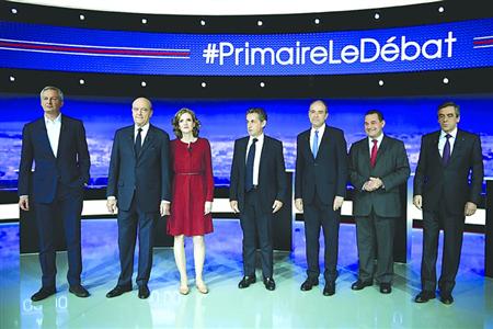 法国共和党7名总统竞选人首场电视辩论，萨科齐（中）民意支持率落后朱佩（左二）。　/CFP