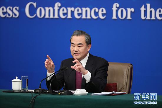 王毅谈中国国际作用：与其说领导不如说责任