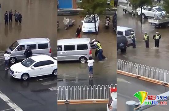 内蒙古交警雨中推车造假，女记者摆拍。中国青年网 图