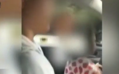 男子抱2岁娃开车拍视频发群 长辈大义灭亲举报