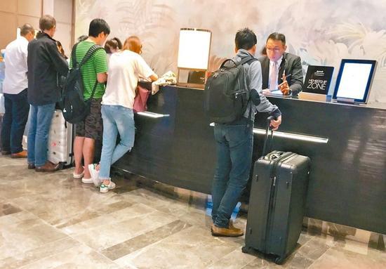 台“交通部”宣布将针对旅馆、游乐业减免地价税和房屋税。（图片来源：台湾《联合报》）