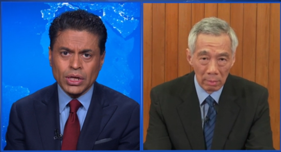 CNN主持人扎卡里亚(左)与李显龙(右)连线现场,图源:CNN新闻网