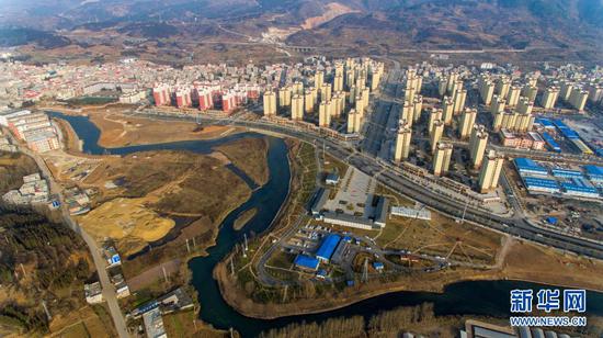 这是位于云南省昭通市境内的跨县易地搬家安顿区靖安新区(2月3日摄,无人机照片)。新华社记者 江文耀 摄