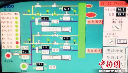 电子屏显示温度正逐步上升 任丽娜 摄